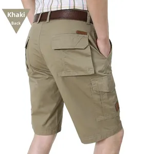 Detail view of khaki cotton cargo shorts with rear flap pockets and a leather belt