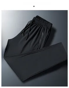 Detail of men's ice silk joggers showing elastic waistband with drawstring and zipper pocket