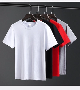 Close-up of high-quality round neck cotton t-shirts in multiple solid colors on hangers