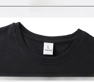 Close-up of a black crew neck cotton T-shirt neckline with size L label detail