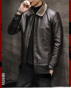 Detail of dark brown leather jacket with plush shearling collar and zipper pockets