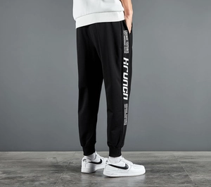 Pantalon de jogging slim noir pour homme avec texte imprimé de style streetwear blanc