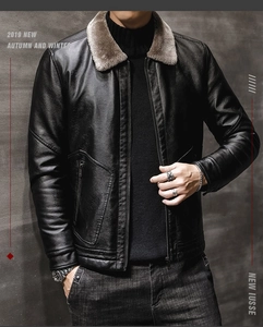 Close-up detail of a men's winter leather jacket featuring a plush faux fur collar