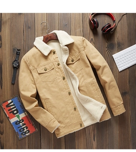 Detail of khaki cargo jacket featuring warm white fleece lining and metallic buttons