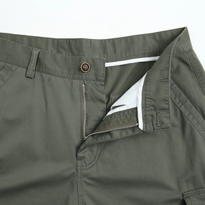 Army green men's casual cotton shorts featuring metal zipper and brown button closure detail