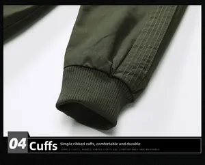 Detail of ribbed cuffs and decorative stitching on a military green cotton cargo jacket