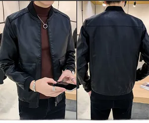 Detail of men's slim fit black PU leather bomber jacket with ribbed cuffs and large pockets