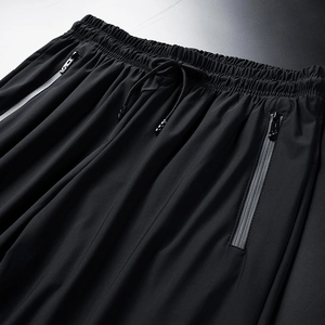 Men's ice silk joggers with drawstring waist and secure zipper pockets in black