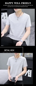 Λεπτομερής προβολή γκρι μελανζέ T-shirt με στρογγυλή λαιμόκοψη και απαλή υφή υφάσματος