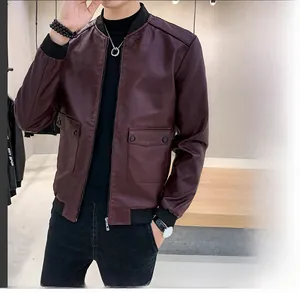 Detail view of burgundy men's PU leather jacket with ribbed cuffs and large pockets
