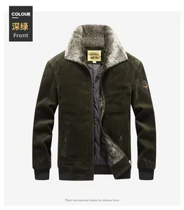 Detail of dark green corduroy jacket showing plush fleece collar and zip closure