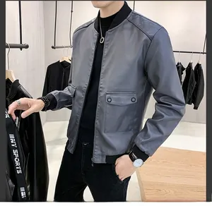 Detailed view of grey PU leather jacket featuring ribbed stand collar and metal zipper