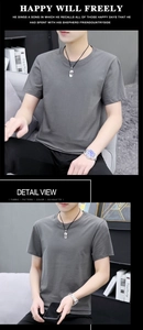 Λεπτομέρεια γκρι κοντομάνικου t-shirt με στρογγυλή λαιμόκοψη και λεπτή υφή βαμβακιού