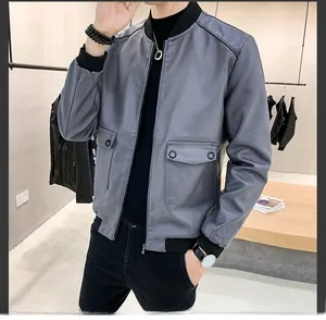 Detail of grey PU leather jacket showing ribbed collar and large metal button pockets
