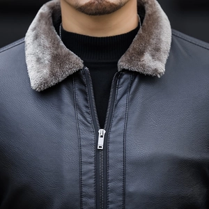 Winter men's faux leather jacket with plush grey lapel collar and silver zipper detail