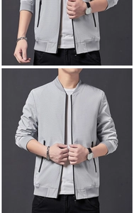 Détail de la veste en mesh gris clair avec fermeture éclair noire et col baseball