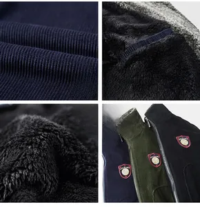 Detail of men's winter corduroy jacket showing thick fleece lining and embroidered badge