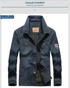 Close-up detail of vintage dark blue denim jacket showing metal buttons and flap pockets