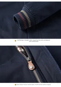 Detail der blauen Business-Jacke mit gestreiften Strickbündchen und Leder-Reißverschluss
