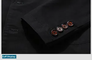 Detail of men's blazer cuffs with four brown resin buttons and fashion engraving