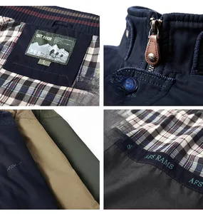 Detailansicht von Stehkragen und Karofutter bei Outdoor-Freizeitjacken für Herren