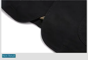 Detailed macro view of the curved hemline and fine stitching on a black men's blazer