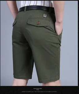 Detail view of army green cargo shorts featuring rear pocket flap and cotton twill texture