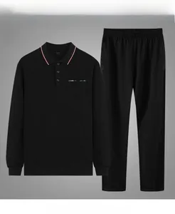 Detail of black long-sleeve polo tracksuit for middle-aged men with stripe polo collar