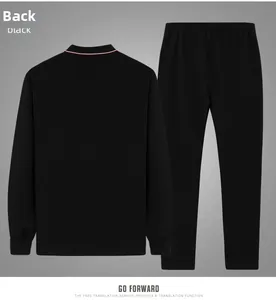 Rear view of black men's casual tracksuit featuring red and white striped neck detail