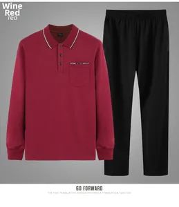Close-up of wine red long sleeve polo shirt and black trousers with pocket detail