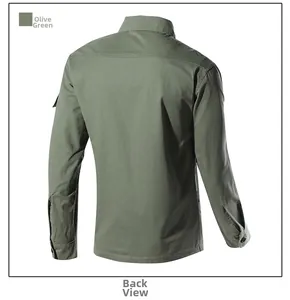 Detail view of the back of a pea green long-sleeved work shirt with visible stitching