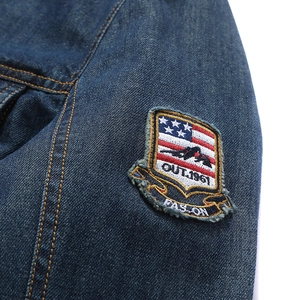 Classic dark blue denim jacket with vintage embroidery and heavy denim texture