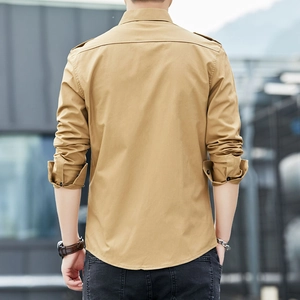 Back view of a khaki slim fit cotton cargo shirt with epaulettes for men in urban setting