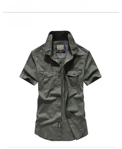 Detail of army green cargo shirt featuring chest flap pockets and off-road embroidery