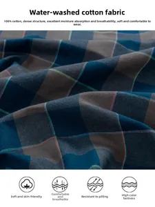 Close-up of 100% cotton checkered shirt fabric showing soft texture and breathable weave