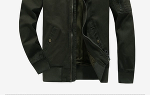Detail of army green bomber jacket with ribbed cuffs and tactical utility sleeve pocket