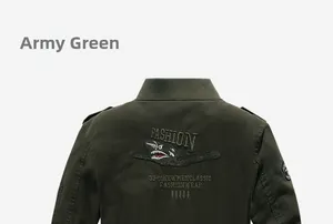 Detailed view of shark embroidery and vintage lettering on army green cotton jacket