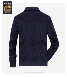 Detail view of the back of a men's dark blue corduroy jacket with ribbed hem and cuffs