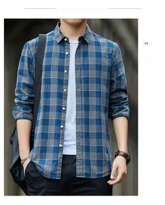 Outdoor model shoot of blue-gray plaid long-sleeve cotton shirt for men in casual city setting