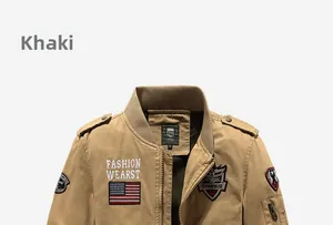 Detail of khaki bomber jacket featuring embroidered flag patch and utility sleeve pocket
