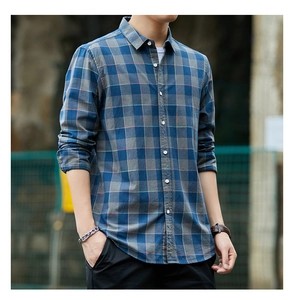 Detail of classic blue and grey plaid cotton long sleeve shirt with pearl buttons for men