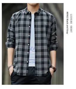 Detail of classic black and gray plaid pattern on a men's casual long sleeve shirt