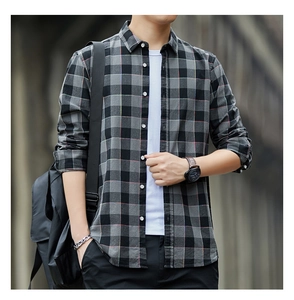 Close-up of men's casual long-sleeved gray plaid shirt featuring cotton fabric texture