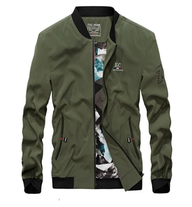 Detail of army green bomber jacket with ribbed collar, logo prints and camouflage lining
