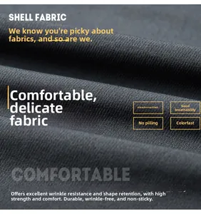 Detail of dark gray stretch fabric with fine twill texture showing durable weave
