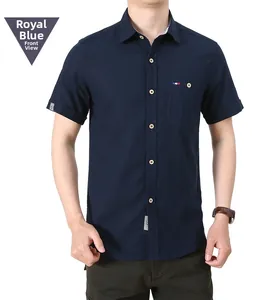 Detail of royal blue short sleeve shirt with stand collar and front chest pocket