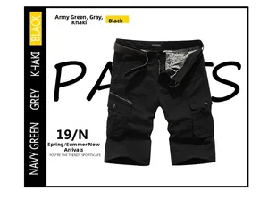 Detailed close-up of black cargo shorts with multi-pocket design and brown faux leather belt