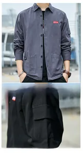 Detail view of cargo pockets and embroidered logo on men's long sleeve work shirt