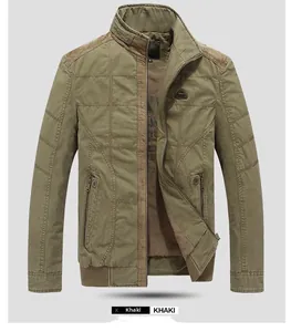 Detailed macro view of khaki cotton canvas jacket with checkered quilting and stand collar