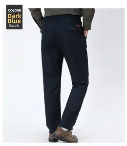 Rear view of dark blue straight-leg trousers with elastic drawstring and buttoned back pockets